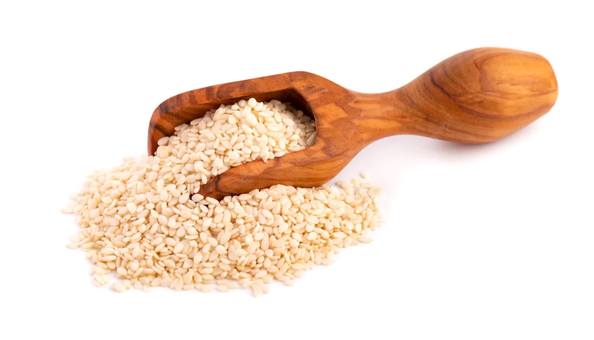 sesame seeds wooden scoop isolated white organic dry sesame seeds 157837 2113